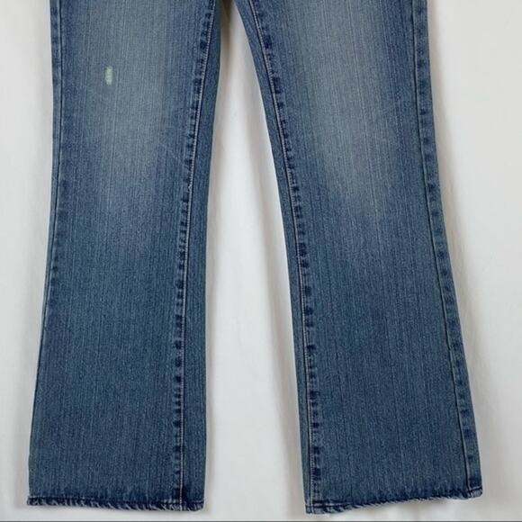 7 For All Mankind Low Rise Bootcut Medium Factory Distressed Wash Jeans Size 30 - Picture 3 of 10